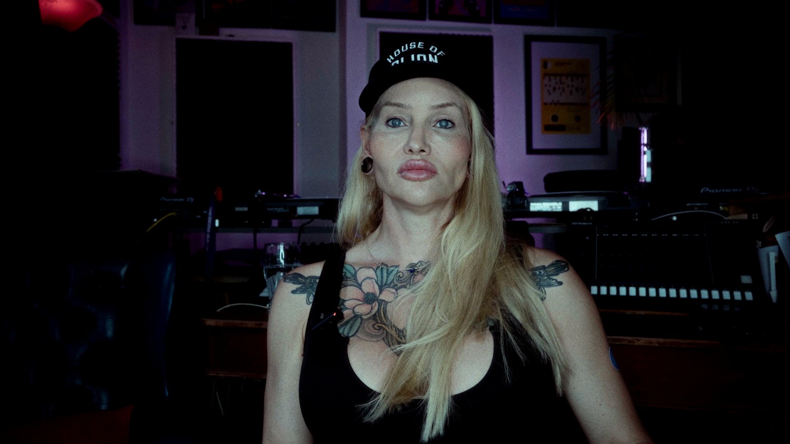 A contributor interviewed in a music studio